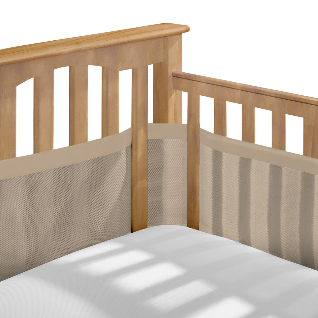 Corner view of BreathableBaby Breathable Mesh Crib Liner – Deluxe Muslin Collection on a crib in Sand Beach