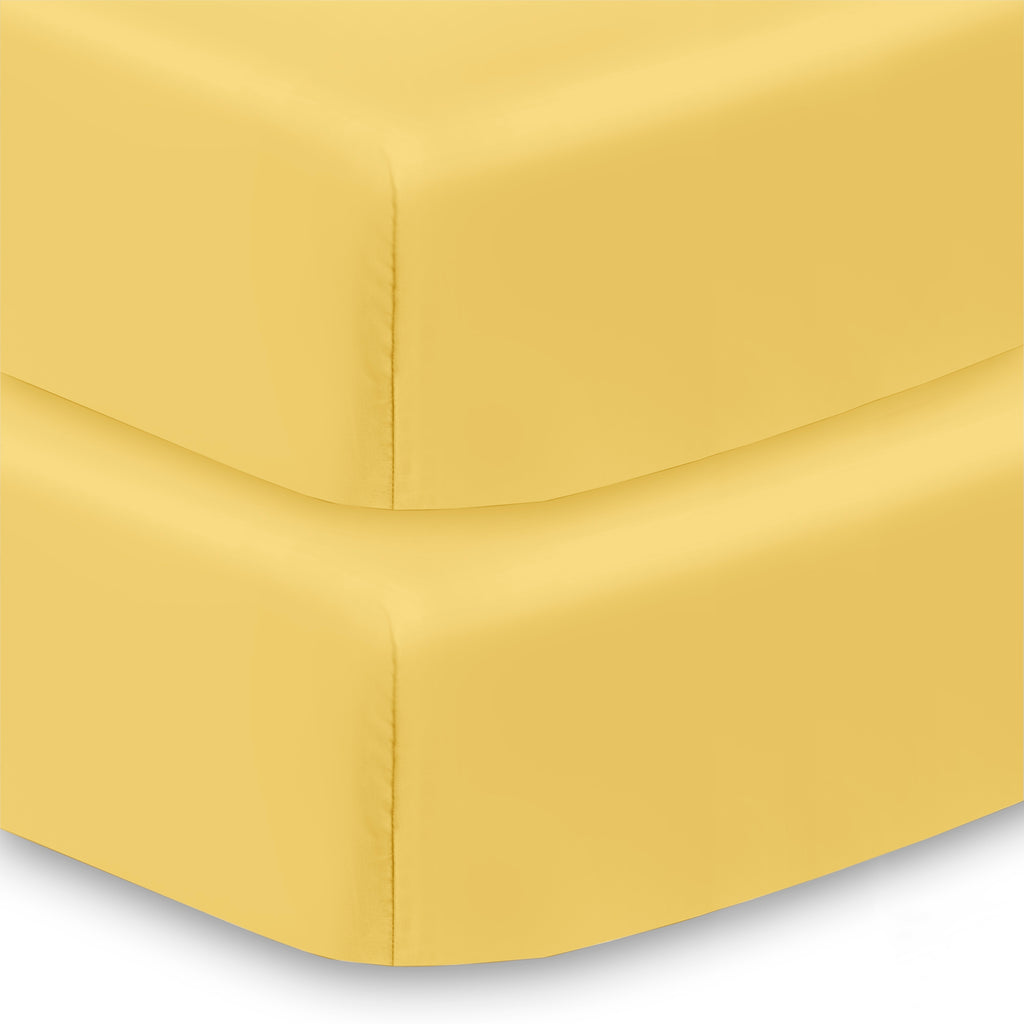 Corner View of BreathableBaby All-in-One Fitted Sheet & Waterproof Cover for Crib Mattresses in Yellow