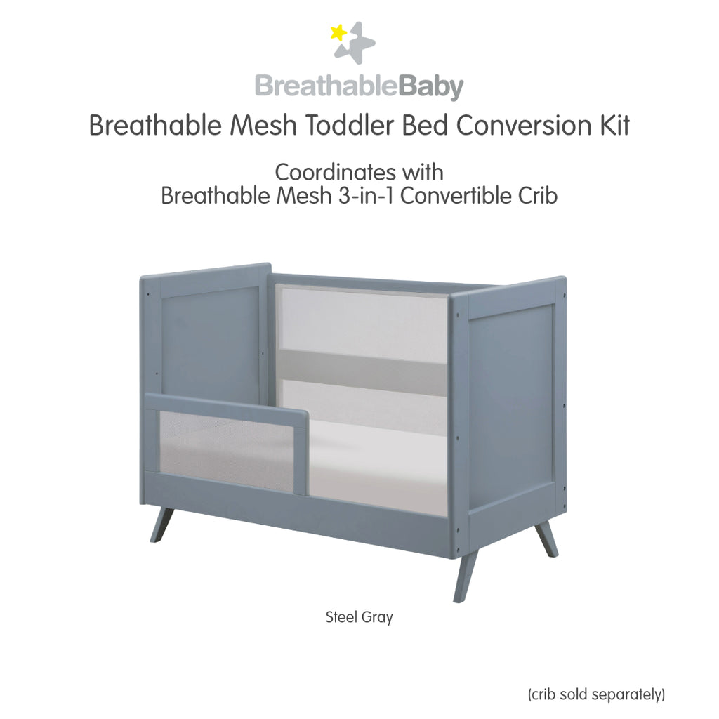 BreathableBaby Breathable Mesh Toddler Bed Conversion Kit in Steel Gray shown on converted toddler bed shown on white background
