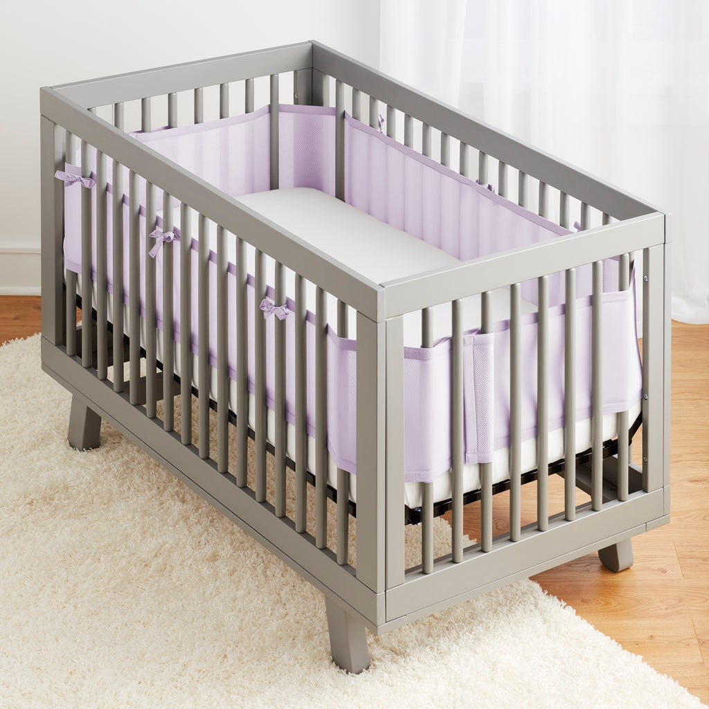 Full crib view of BreathableBaby Breathable Mesh Crib Liner on a crib in Lavender