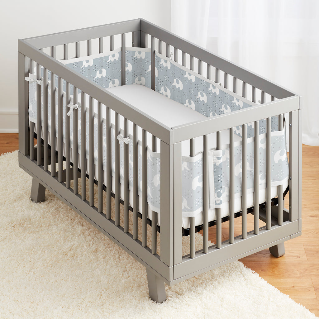 Full crib view of BreathableBaby Breathable Mesh Crib Liner on a crib in Peaceful Elephant Gray
