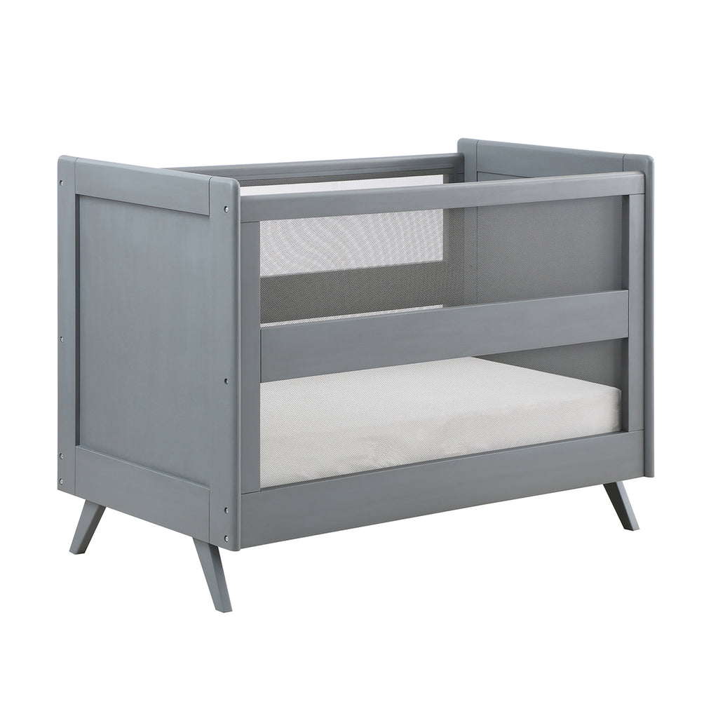 Angled Image of BreathableBaby Breathable Mesh 3-in-1 Convertible Crib in Gray on White Background