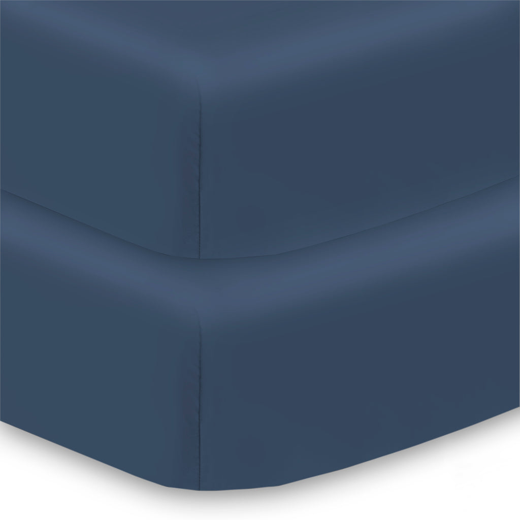 Corner View of BreathableBaby All-in-One Fitted Sheet & Waterproof Cover for Crib Mattresses in Navy