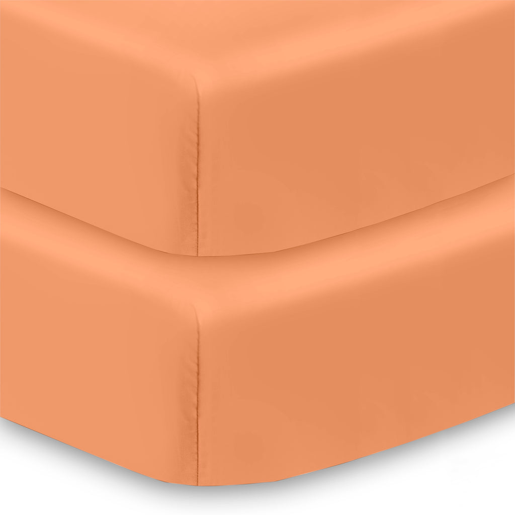 Corner View of BreathableBaby Cotton Percale Fitted Sheet for Crib & Toddler Bed Mattresses in Orange