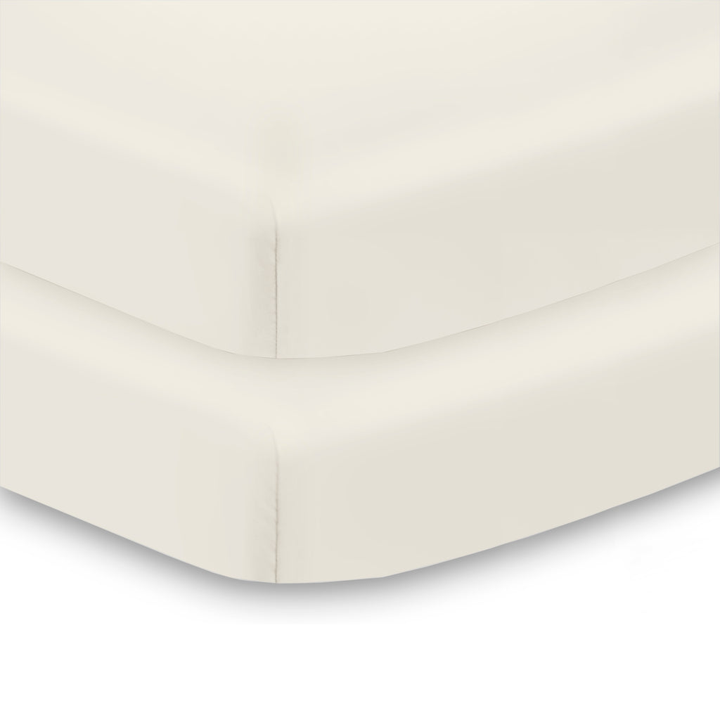 Corner View of BreathableBaby All-in-One Fitted Sheet & Waterproof Cover for Mini Crib Mattresses in Ecru