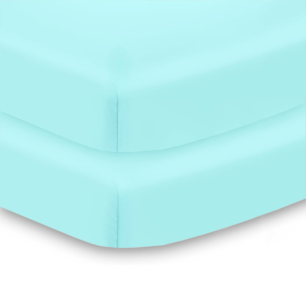 Corner View of BreathableBaby All-in-One Fitted Sheet & Waterproof Cover for Mini Crib Mattresses in Blue Green Aqua