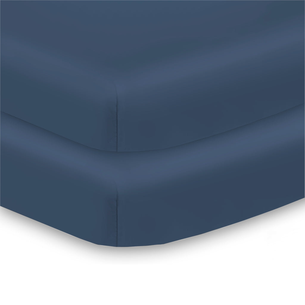 Corner View of BreathableBaby All-in-One Fitted Sheet & Waterproof Cover for Mini Crib Mattresses in Navy