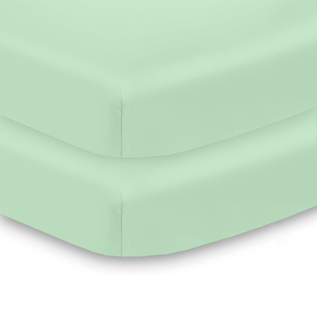 Corner View of BreathableBaby All-in-One Fitted Sheet & Waterproof Cover for Mini Crib Mattresses in Mint Green