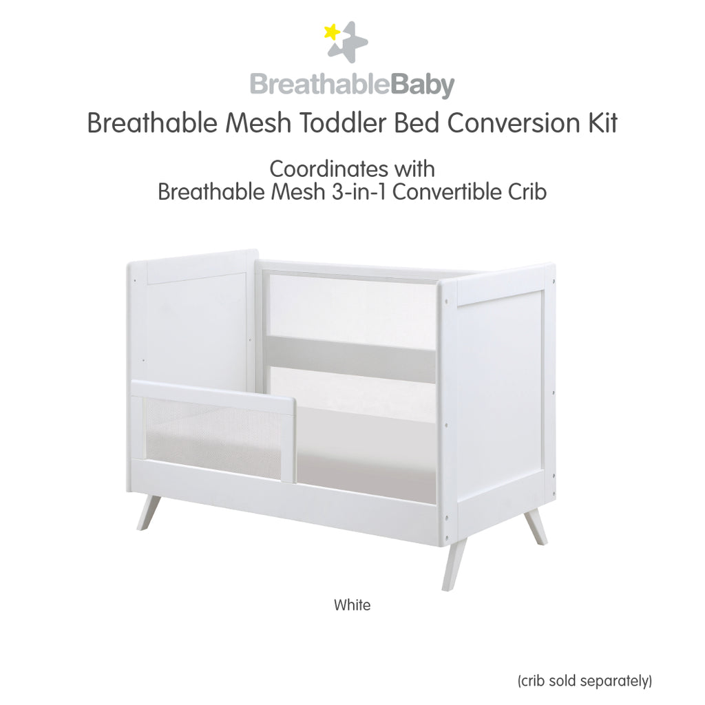 BreathableBaby Breathable Mesh Toddler Bed Conversion Kit in White shown on converted toddler bed shown on white background