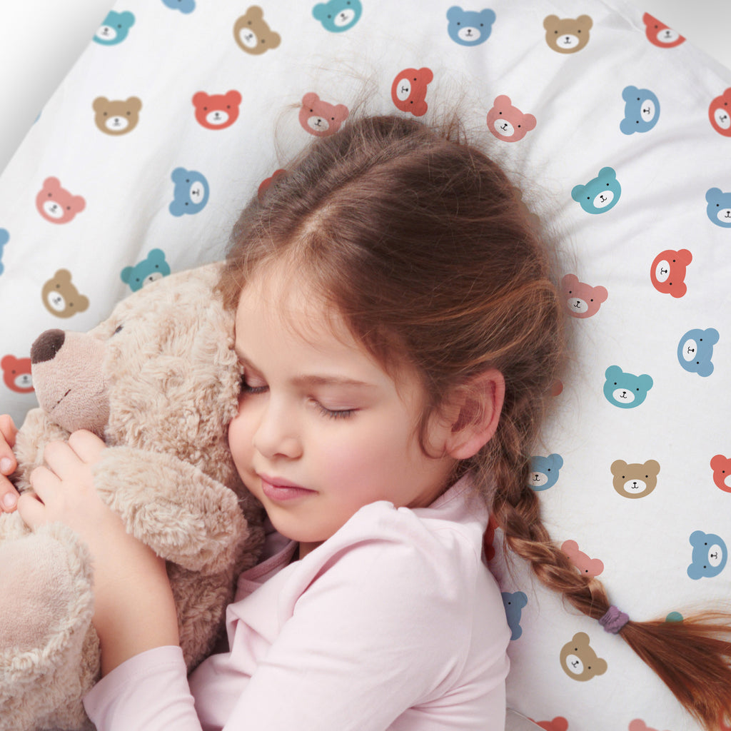 Child using BreathableBaby Cotton Percale Pillowcase for Toddler Pillow in Bears