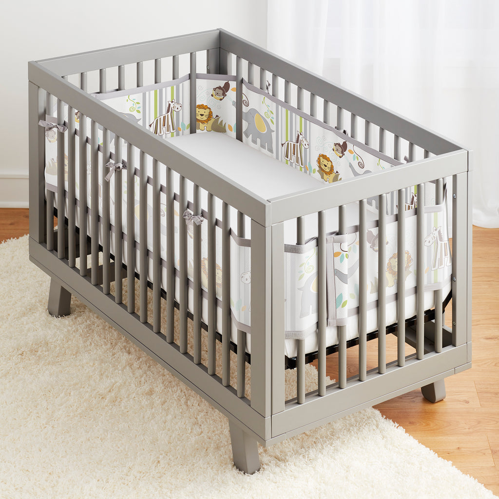 Full crib view of BreathableBaby Breathable Mesh Crib Liner on a crib in Safari Fun Too