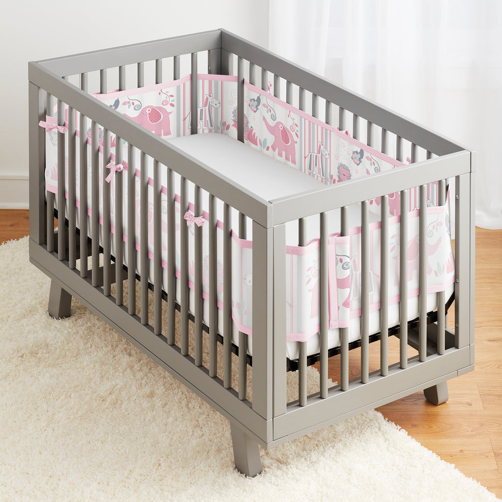 Full crib view of BreathableBaby Breathable Mesh Crib Liner on a crib in Safari Fun Girl