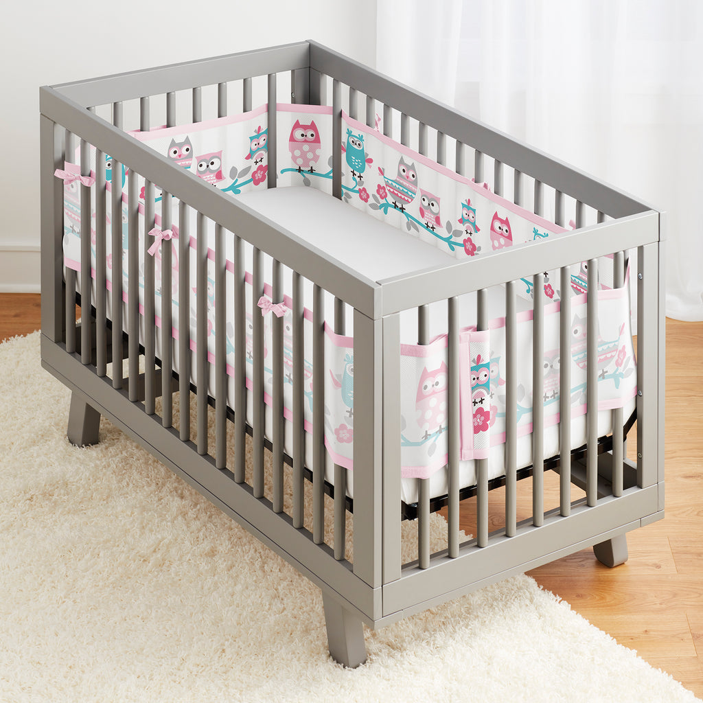 Full crib view of BreathableBaby Breathable Mesh Crib Liner on a crib in Owl Fun Pink