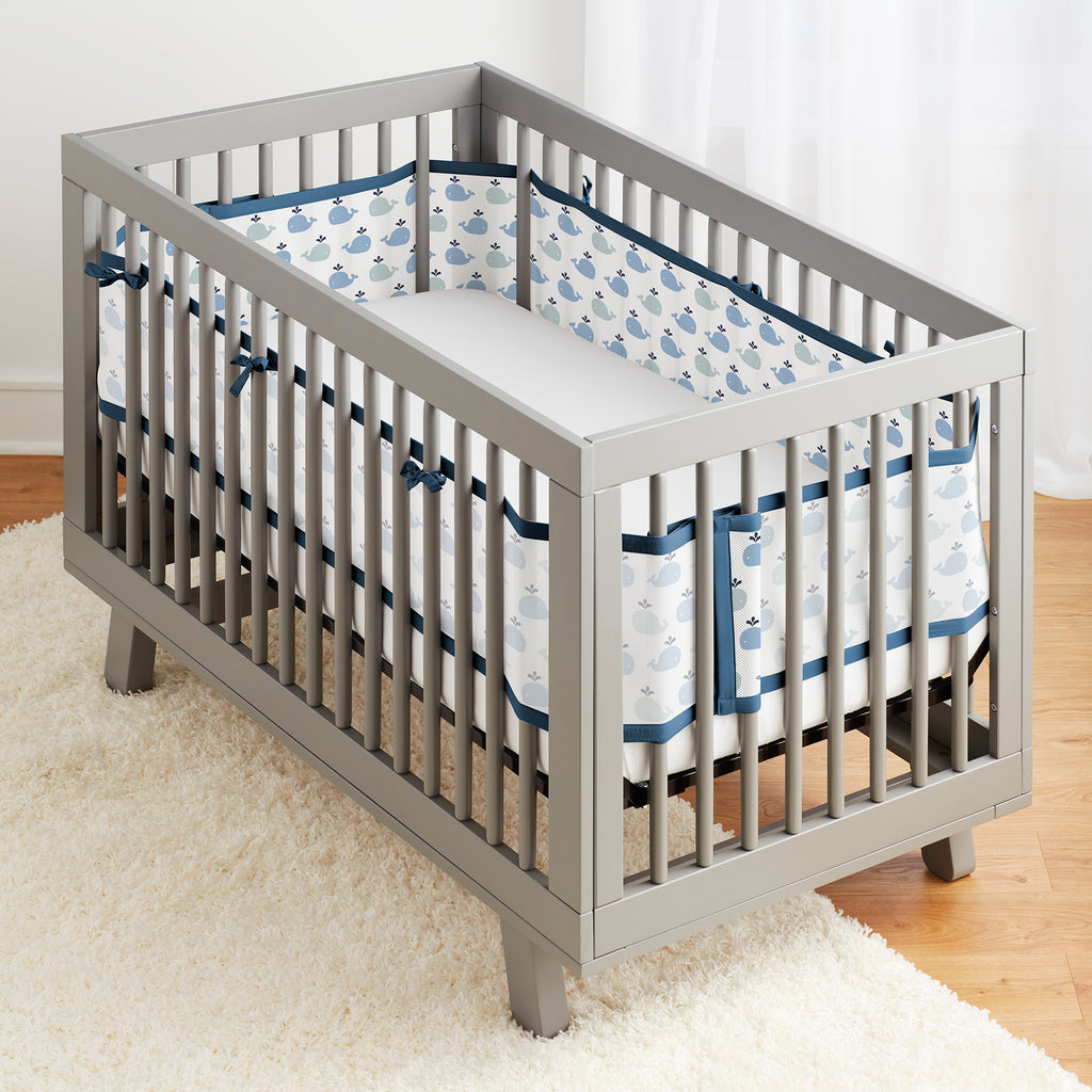 Full crib view of BreathableBaby Breathable Mesh Crib Liner on a crib in Little Whale Navy