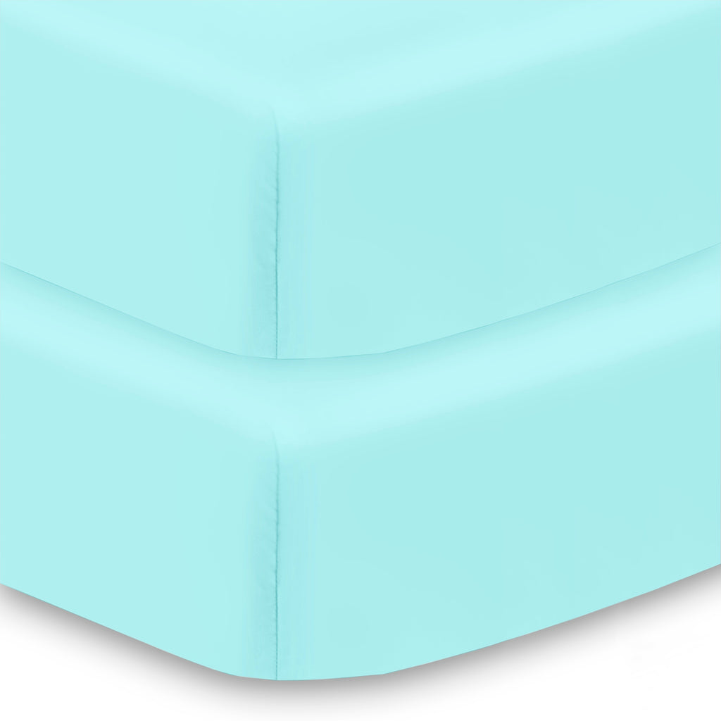 Corner View of BreathableBaby All-in-One Fitted Sheet & Waterproof Cover for Crib Mattresses in Blue Green Aqua