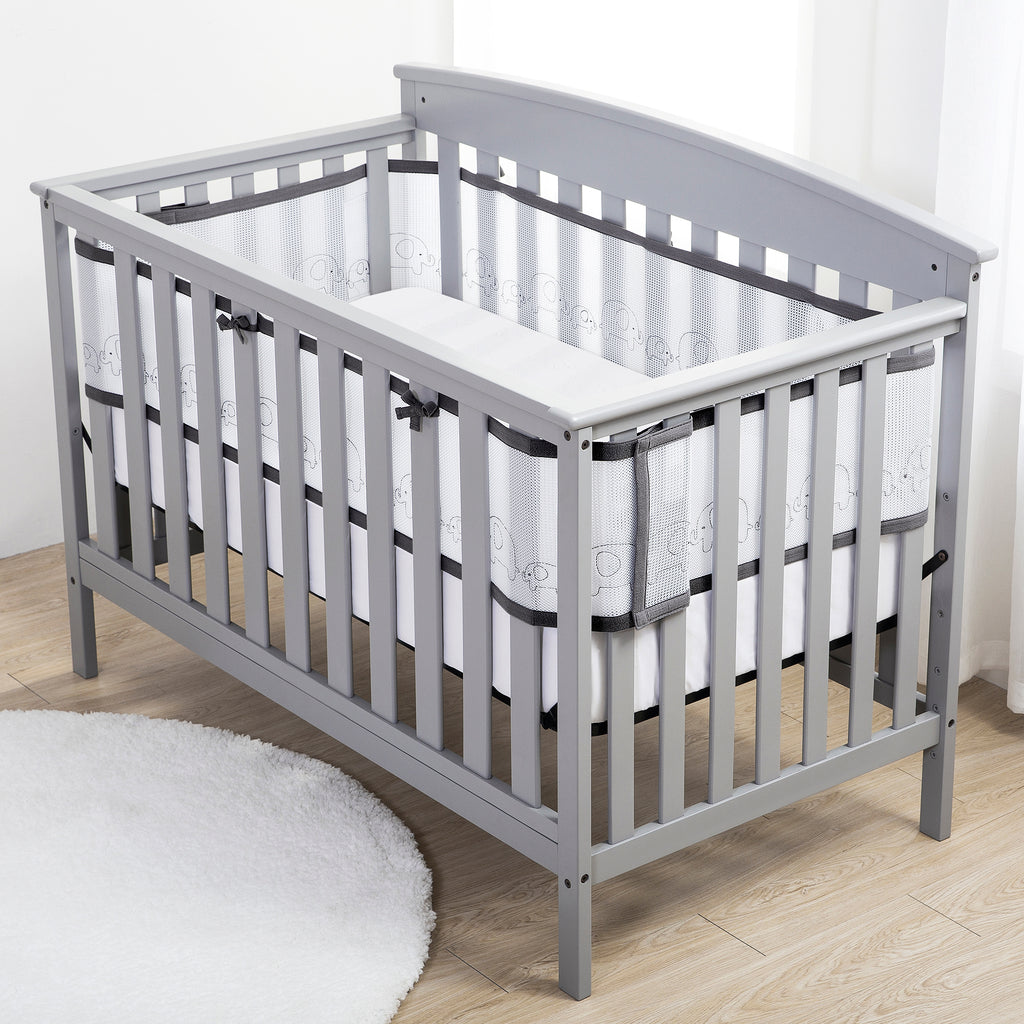Full crib view of BreathableBaby Breathable Mesh Crib Liner – Deluxe Embroidered Collection on a crib in Elephants