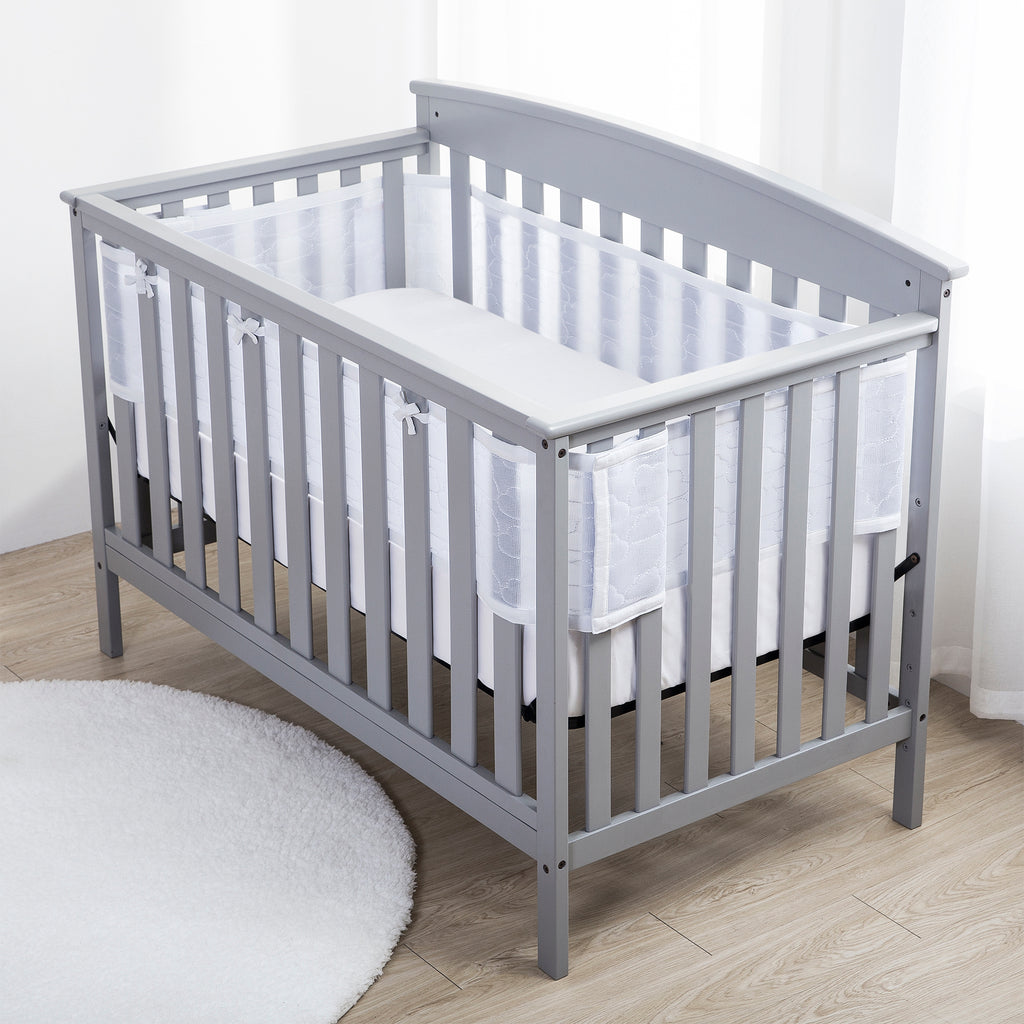 Full crib view of BreathableBaby Breathable Mesh Crib Liner – Deluxe Sheer Quilted Collection on a crib in Clouds